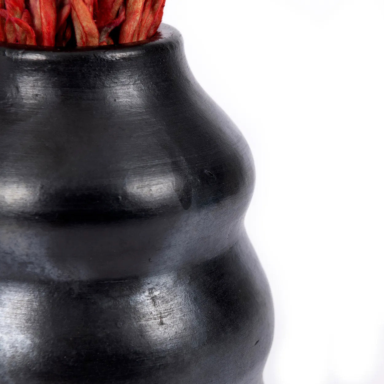 Le vase brûlé